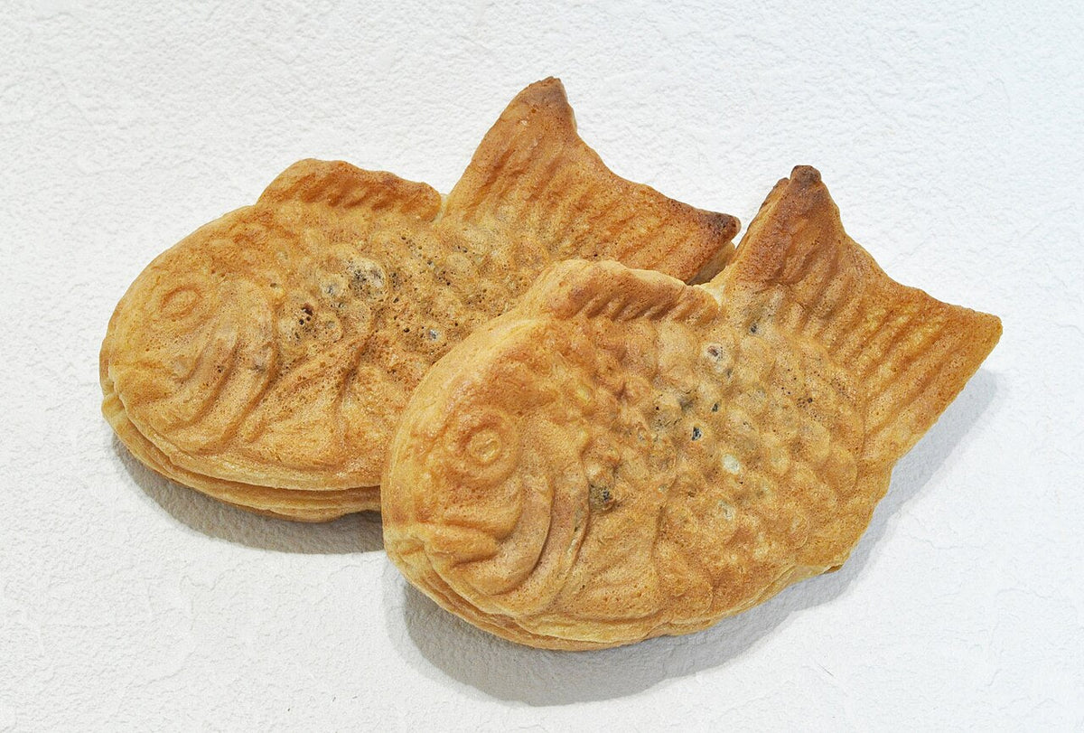 Taiyaki — a browned Japanese fish-shaped cake filled with sweet red bean paste
