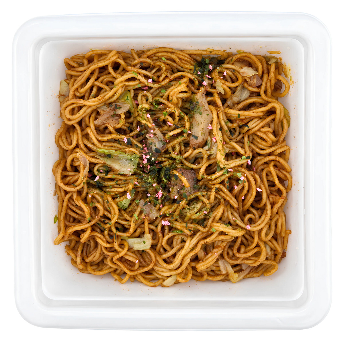 Nissin UFO Yakisoba Large made up, seen from above — noodles glossy with sauce, green seaweed and pickled red ginger on top