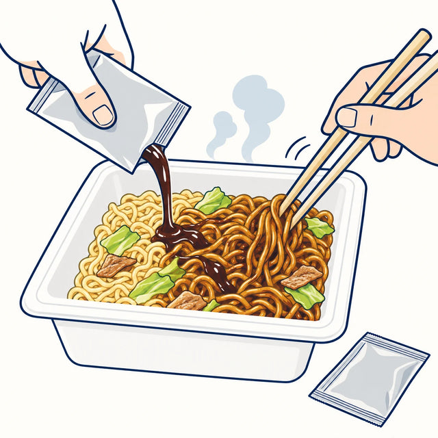 The sauce goes on after you drain, never before. Stir it right through the noodles, then finish with the aonori and pickled ginger.